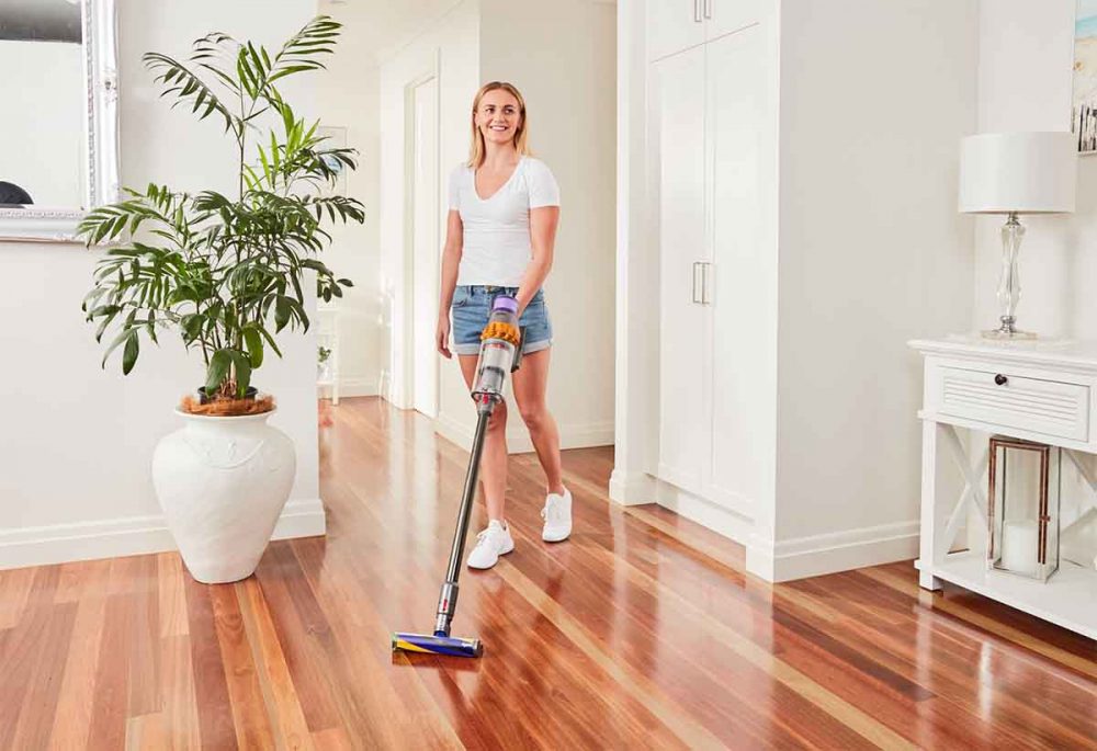 Ariarne Titmus cleaning with the Dyson V15 Detect Total Clean.