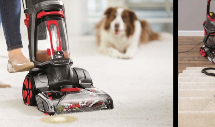 The BISSELL ProHeat 2X Revolution Pet Pro being used on carpet floor and stairs.