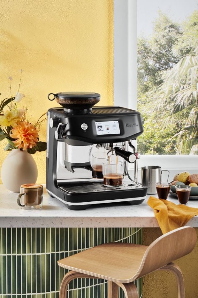 Breville The Barista Touch™ Impress Coffee Machine pouring coffee.