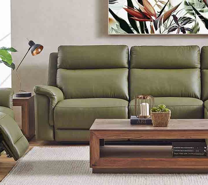 A comfortable reclining leather sofa suite.