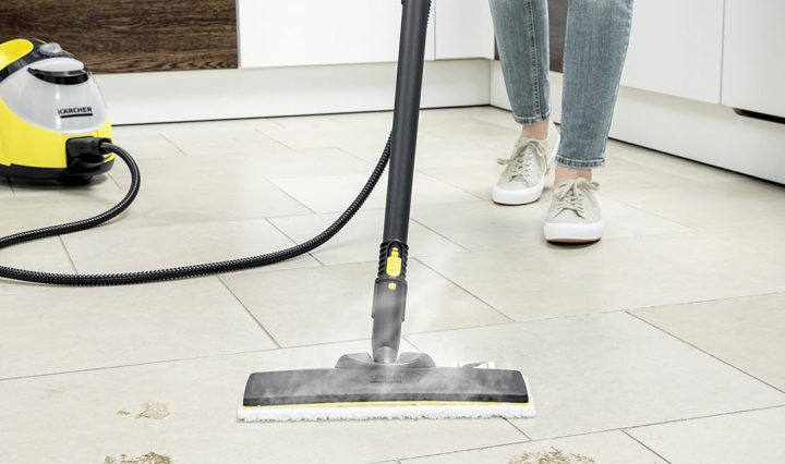The Karcher SC 5 Premium Portable Steam Cleaner being used on tile floors.