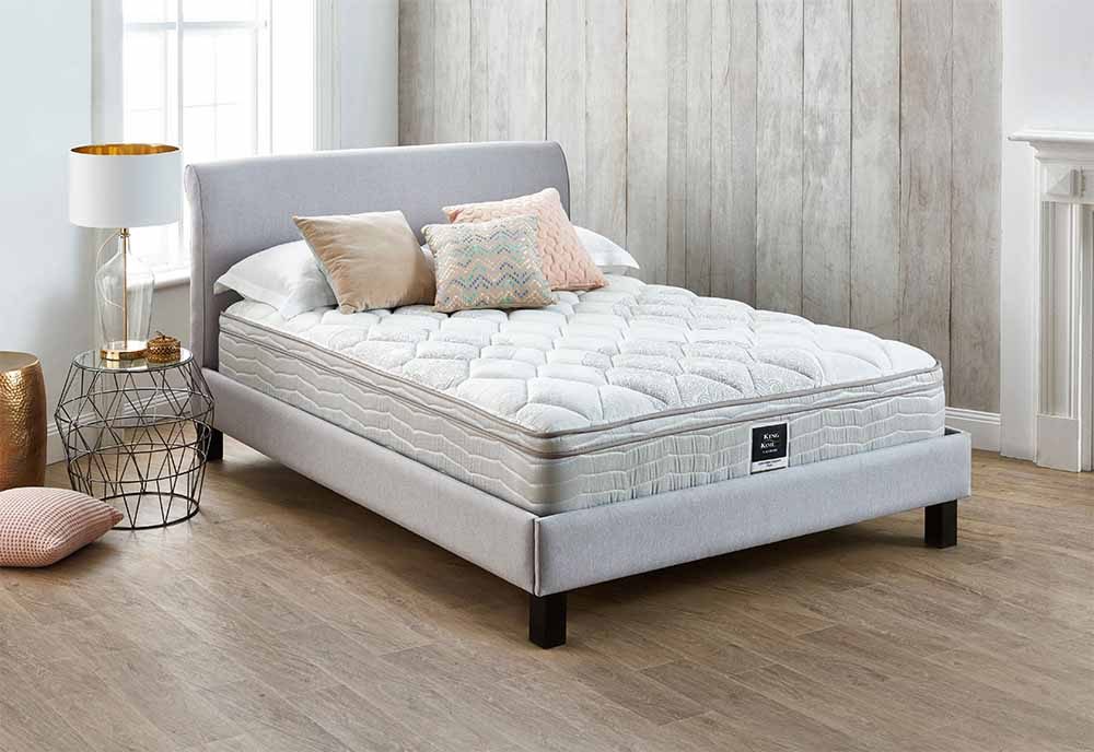 The King Koil Conforma Essence Queen Mattress in a guest room.