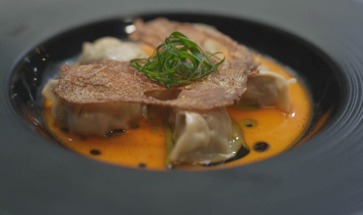 Quail + Nectarine Dumplings in a bowl.