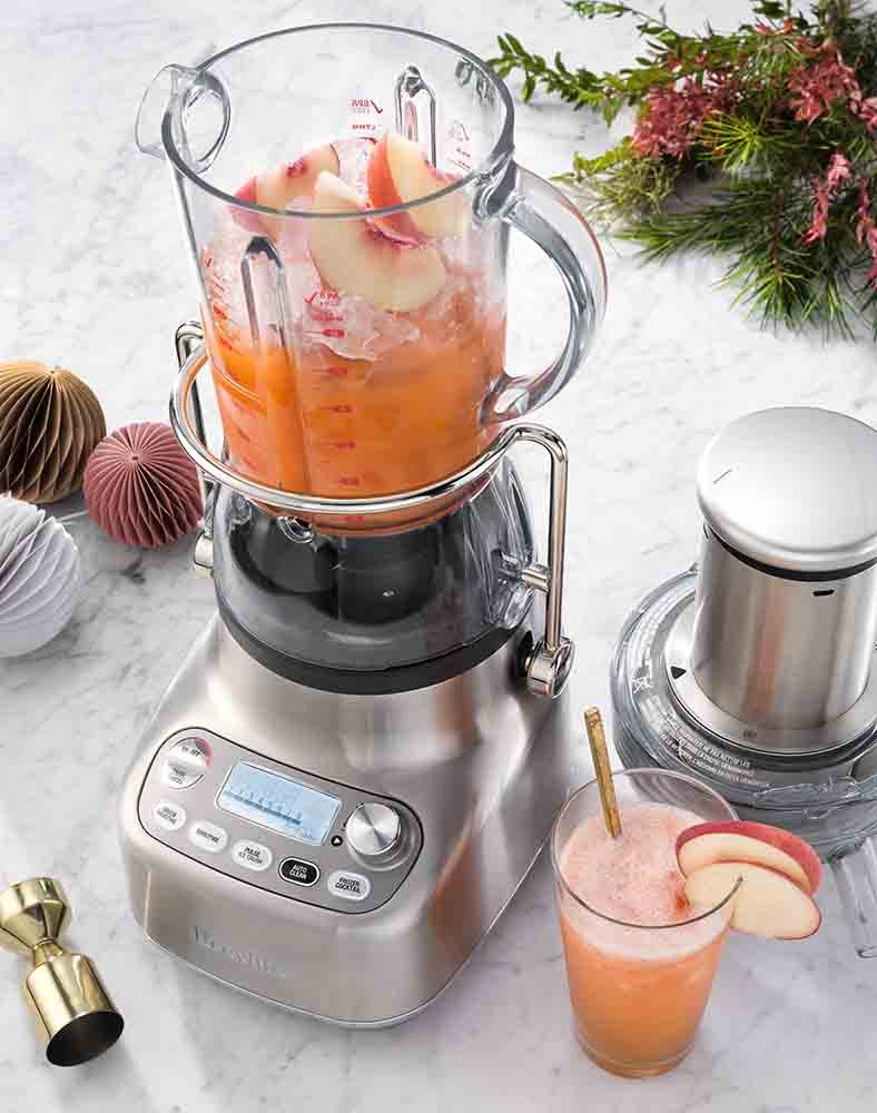 The Breville Bluicer being used to create a White Peach Aperol Spritz.