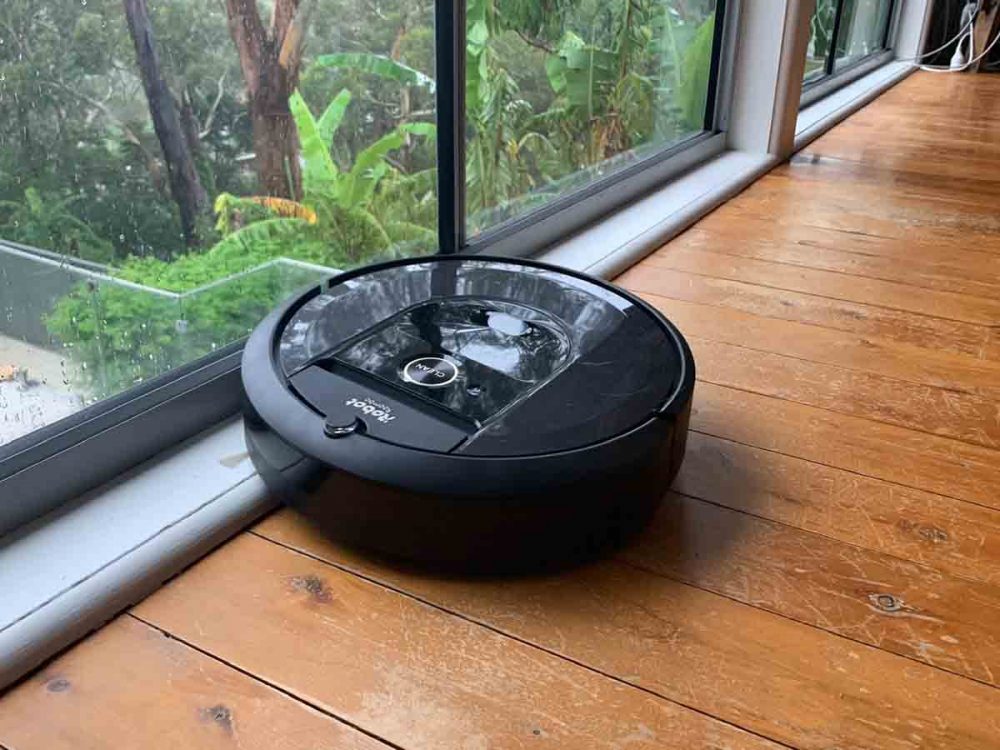 The iRobot Roomba i7+ Robtic Vacuum cleaning floorbords. 