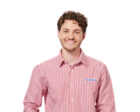 Harvey Norman staff member with glasses, smiling in uniform