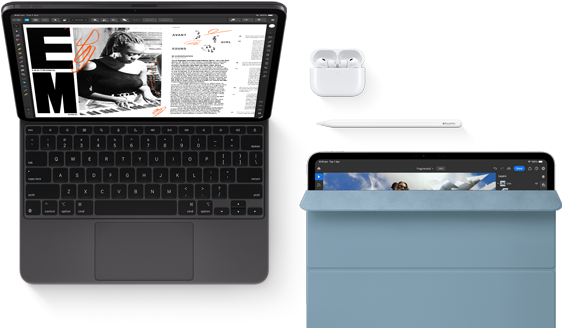 iPad Pro attached to Magic Keyboard, front exterior, space black colour, rounded corners, black display bezel, open, display showing article editing app with text and photograph of a woman playing music, AirPods 4 in open case, blue Smart Folio cover on iPad Pro with Apple Pencil Pro resting atop device, cover slightly open revealing display